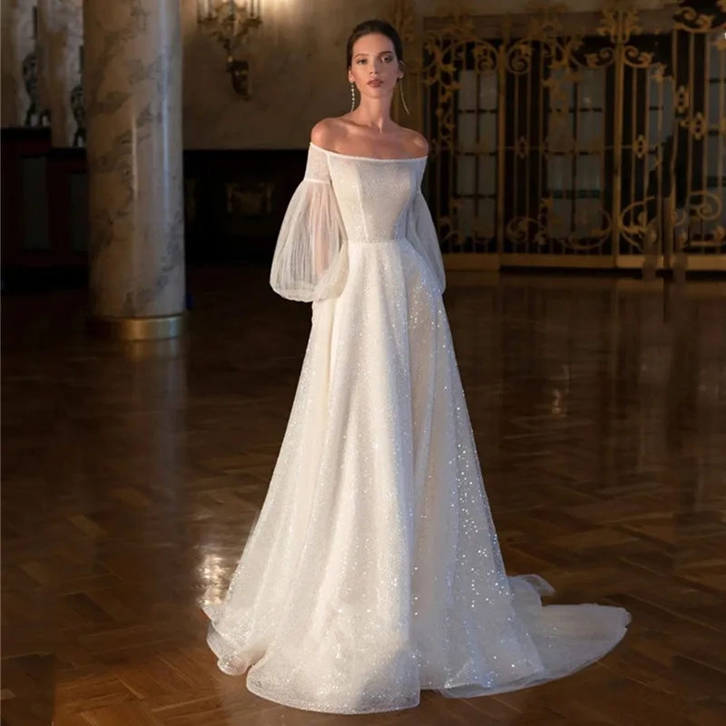 Luxury Boat Neck Lantern sleeves Glitter Appliques Tulle A-line Wedding Dress Bridal Elegant Illusion Zipper Back Custom Made
Luxury Boat Neck Lantern sleeves Glitter Appliques Tulle A-line Wedding Dress Bridal Elegant Illusion Zipper Back Custom Made