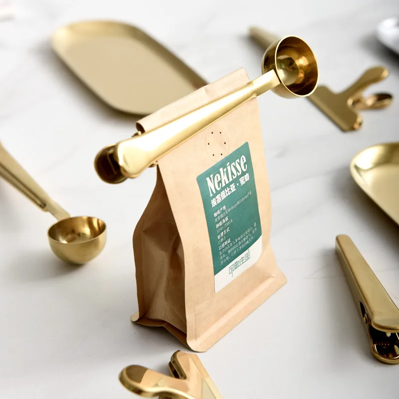 Nordic golden coffee spoon creative stainless steel sealing clip spoon tea oatmeal snack sealing coffee measuring spoon 
Nordic golden coffee spoon creative stainless steel sealing clip spoon tea oatmeal snack sealing coffee measuring spoon