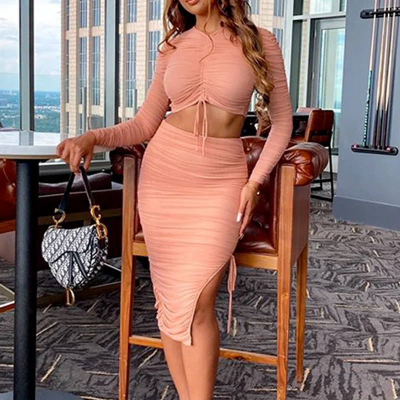 Pleated Hollow Ladies Tight-fitting Solid Short Blouse Short Skirt Ladies Sexy Tight-fitting Drawstring Ladies Two-piece Suit
Pleated Hollow Ladies Tight-fitting Solid Short Blouse Short Skirt Ladies Sexy Tight-fitting Drawstring Ladies Two-piece Suit