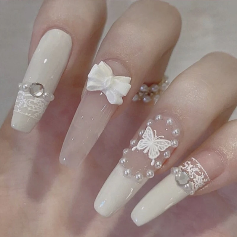 24pcs Artificial Nails Rhinestone Pearl False Nails Full Cover Nail Tips Butterfly Cartoon Press On French Ballerina Fake Nail
24pcs Artificial Nails Rhinestone Pearl False Nails Full Cover Nail Tips Butterfly Cartoon Press On French Ballerina Fake Nail