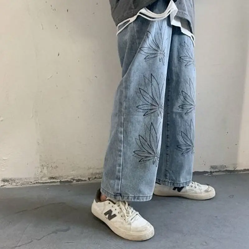 Korean jeans couple flower vine printed straight trousers vintage high street hip-hop style personality couple trousers trend 
Korean jeans couple flower vine printed straight trousers vintage high street hip-hop style personality couple trousers trend