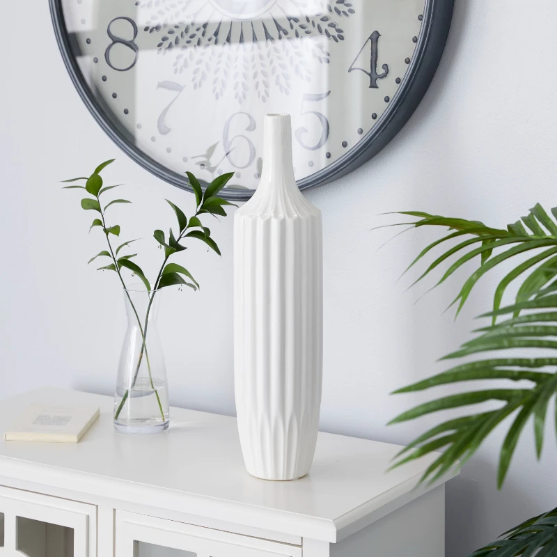 Modern Ceramic Tall White Decorative Vase with Vertical Groove Pattern 5"W x 19"H
Modern Ceramic Tall White Decorative Vase with Vertical Groove Pattern 5"W x 19"H