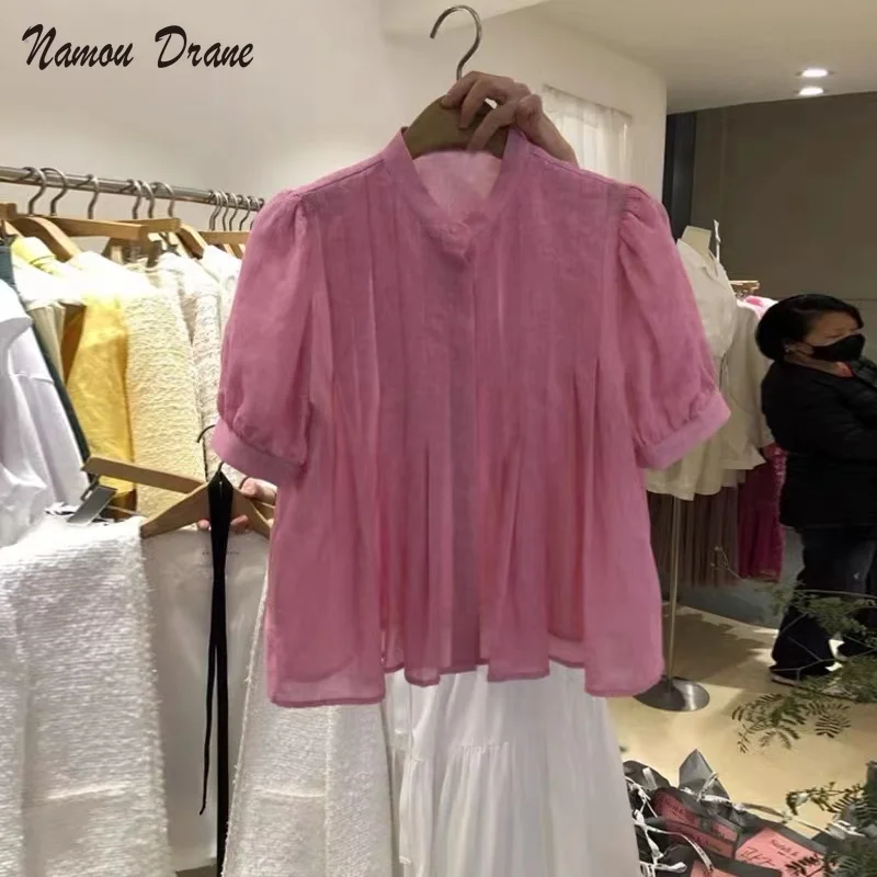 French Temperament Pleated Shirt for Women Summer 2022 New Retro Stand Collar Shirt for Women Loose Chic Bubble Sleeve Shirt
French Temperament Pleated Shirt for Women Summer 2022 New Retro Stand Collar Shirt for Women Loose Chic Bubble Sleeve Shirt