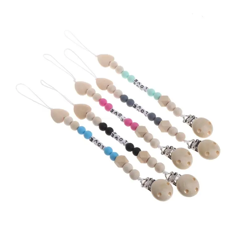 Силиконовые деревянные зажимы для соски для прорезывания зубов, цепной держатель для сосков, детские жевательные игрушки Du /
Силиконовые деревянные зажимы для соски для прорезывания зубов, цепной держатель для сосков, детские жевательные игрушки Du /