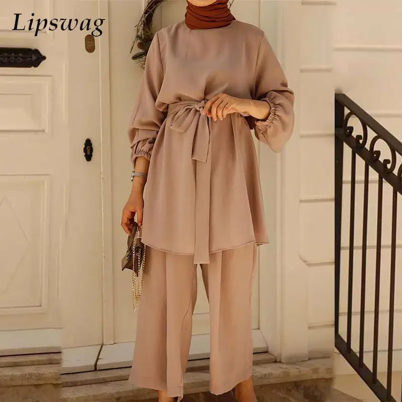 Solid Fashion Sashes Long Shirt Suit Women Casual Loose Conservative Set Elegant O-Neck Pullover Tops And Wide Leg Pants Outfits
Solid Fashion Sashes Long Shirt Suit Women Casual Loose Conservative Set Elegant O-Neck Pullover Tops And Wide Leg Pants Outfits