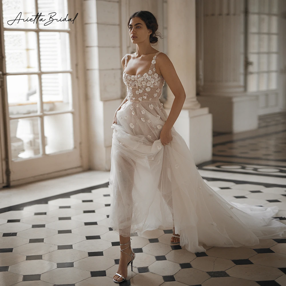 Arietta Square Neck Beach Wedding Dresses Sleeveless 3D Flowers Illusion Tulle A-Line Bridal Gowns Backless Long Bride Dresses
Arietta Square Neck Beach Wedding Dresses Sleeveless 3D Flowers Illusion Tulle A-Line Bridal Gowns Backless Long Bride Dresses