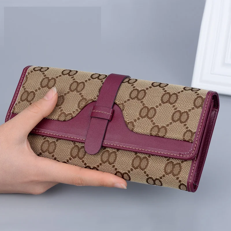 Wallet Women's Long Large Capacity Phone Bag Canvas and Leather Ladies Folding Women's Tri-fold Wallet Luxury Designer
Wallet Women's Long Large Capacity Phone Bag Canvas and Leather Ladies Folding Women's Tri-fold Wallet Luxury Designer