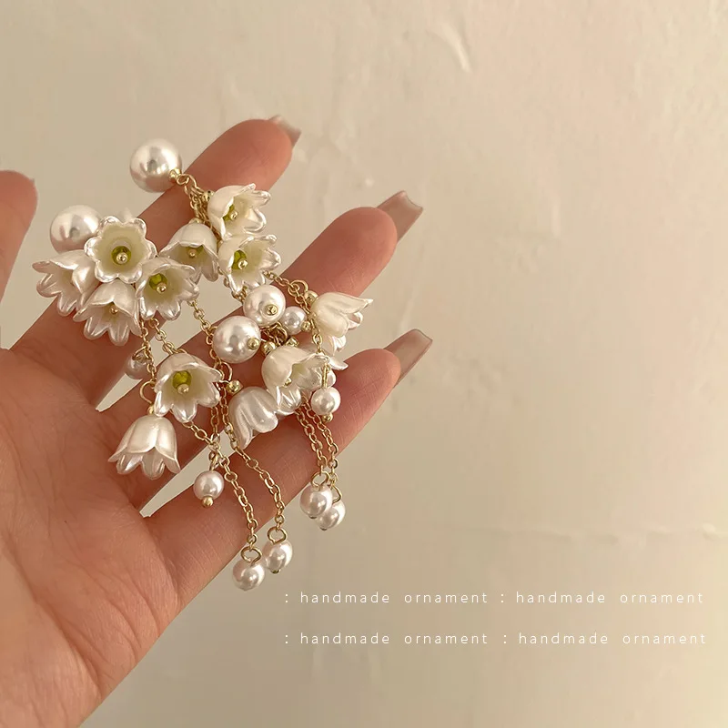Elegant White Pearl Flower Earrings Women Long Fringe Fashion Jewelry 2022 New Fashion Party Wedding Stud Earrings
Elegant White Pearl Flower Earrings Women Long Fringe Fashion Jewelry 2022 New Fashion Party Wedding Stud Earrings