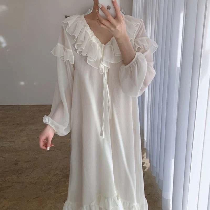 French Courty Style Retro Dress 2022 Spring Summer V-Neck Ruffle Tie Puff Sleeve Loose Dress Casual Holiday Beach Maxi Dress
French Courty Style Retro Dress 2022 Spring Summer V-Neck Ruffle Tie Puff Sleeve Loose Dress Casual Holiday Beach Maxi Dress