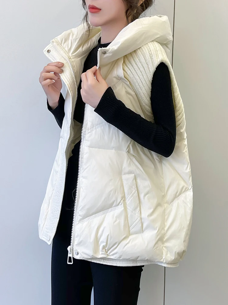 Женский пуховой жилет без рукавов, теплая Повседневная Свободная трикотажная куртка на белом утином пуху в стиле пэчворк, жилет с капюшоном для зимы
Женский пуховой жилет без рукавов, теплая Повседневная Свободная трикотажная куртка на белом утином пуху в стиле пэчворк, жилет с капюшоном для зимы