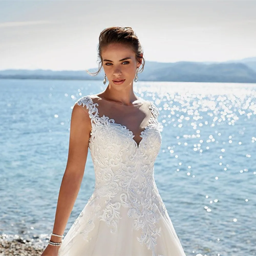 Plus Size Wedding Dress Lace Applique Sleeveless Illusion Beach Wedding Dress Vintage A line Princess Bridal Gowns
Plus Size Wedding Dress Lace Applique Sleeveless Illusion Beach Wedding Dress Vintage A line Princess Bridal Gowns