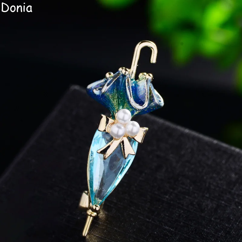 Donia Jewelry Fashion Enamel Titanium Steel Micro-Inlaid AAA Colored Zircon Umbrella Brooch Luxury Retro Pearl Pin.
Donia Jewelry Fashion Enamel Titanium Steel Micro-Inlaid AAA Colored Zircon Umbrella Brooch Luxury Retro Pearl Pin.