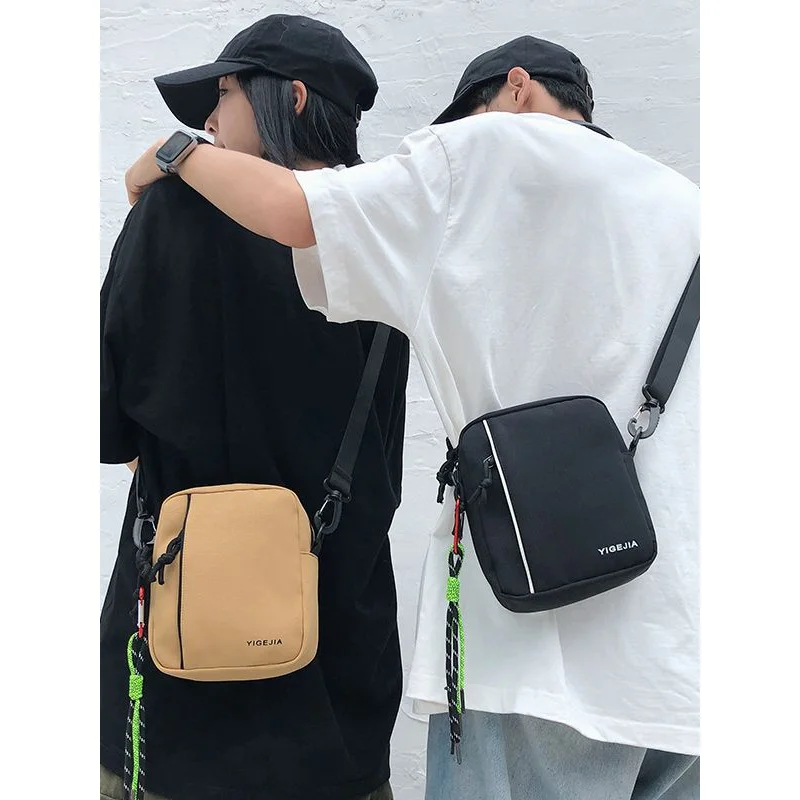 Solid color Men's Messenger Bag White Canvas Pouch Female Small Square Bag Mobile Carrier Shoulder Bag Quality Lovers Package
Solid color Men's Messenger Bag White Canvas Pouch Female Small Square Bag Mobile Carrier Shoulder Bag Quality Lovers Package