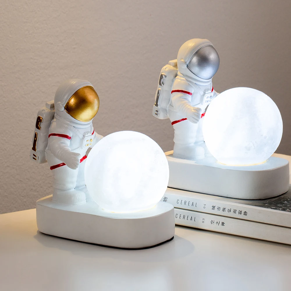 Kawaii Desk Accessories Moon Astronaut Statue Room Ornaments Miniature Spaceman Night Lights Home Decoration Bookshelf Figurine 
Kawaii Desk Accessories Moon Astronaut Statue Room Ornaments Miniature Spaceman Night Lights Home Decoration Bookshelf Figurine