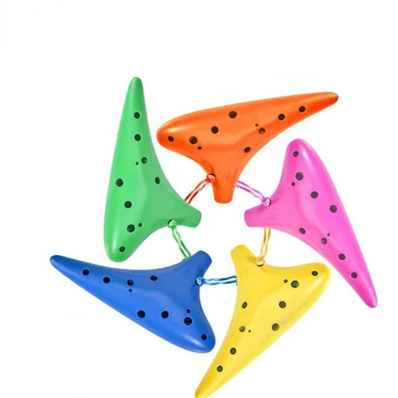 Вводный резиновый каучук Ocarina Flute с 12 отверстиями для мелодий музыкальный инструмент с руководством по музыке для начинающих 
Вводный резиновый каучук Ocarina Flute с 12 отверстиями для мелодий музыкальный инструмент с руководством по музыке для начинающих
