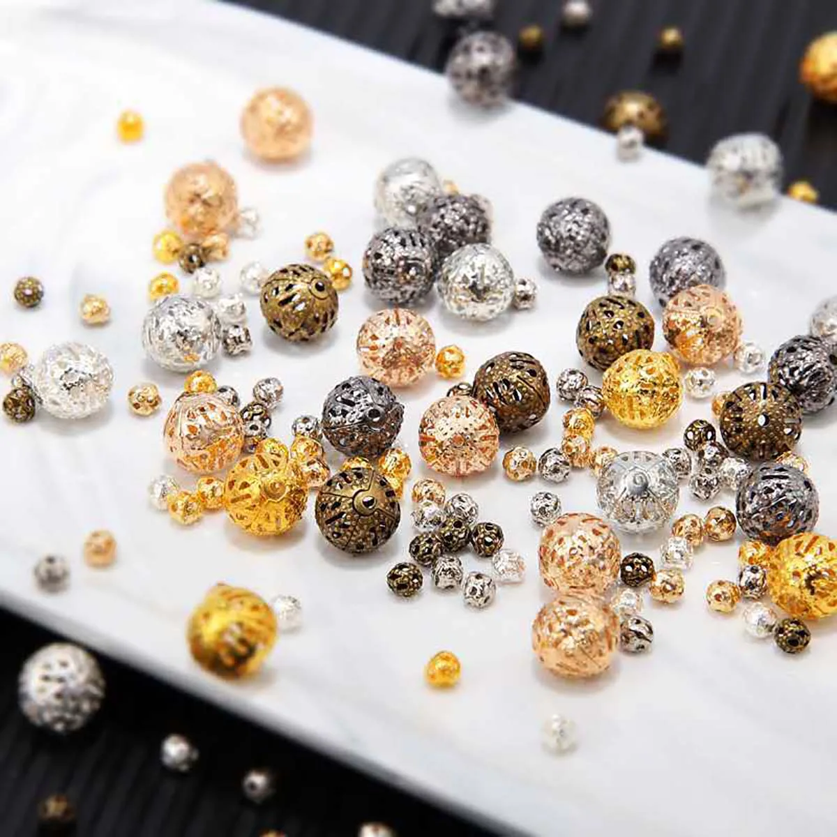 50/100Pcs 4x4mm 10x10mm Hollow Ball Flower Beads Metal Charms Spacer Beads for Jewelry Making Diy Handmade Accessories 6 Colors
50/100Pcs 4x4mm 10x10mm Hollow Ball Flower Beads Metal Charms Spacer Beads for Jewelry Making Diy Handmade Accessories 6 Colors