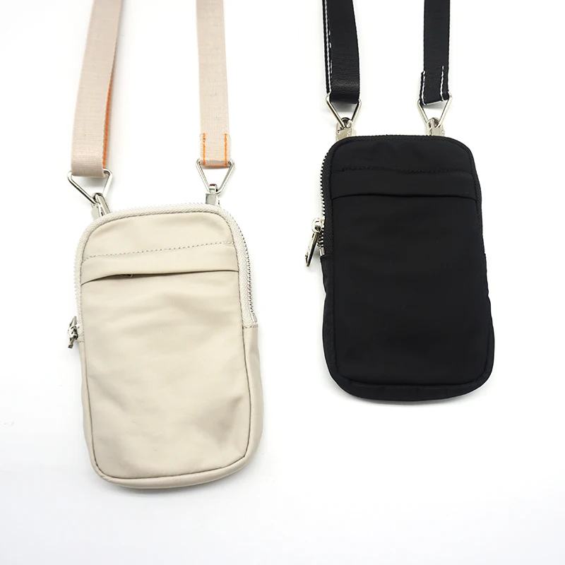 High Quality Nylon Mobile Phone Bag Spanish Fashion Luxury Brand Women's Bag Simple Solid Color Waist Bag Women's Coin Purse
High Quality Nylon Mobile Phone Bag Spanish Fashion Luxury Brand Women's Bag Simple Solid Color Waist Bag Women's Coin Purse