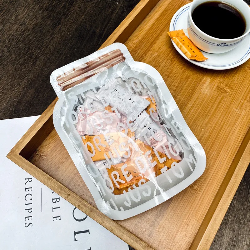 50pcs Transparent Clear Plastic English Bottle Shape Ziplock Snowflake Nougat Button Biscuit Packaging Candy Bags
50pcs Transparent Clear Plastic English Bottle Shape Ziplock Snowflake Nougat Button Biscuit Packaging Candy Bags