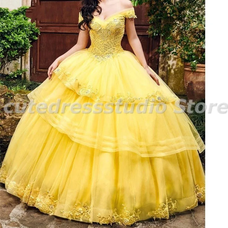 Charro Yellow Quinceanera Dresses with Wrap Lace Appliques Off the Shoulder Sweet 16 Dress Beading vestidos de 15 años
Charro Yellow Quinceanera Dresses with Wrap Lace Appliques Off the Shoulder Sweet 16 Dress Beading vestidos de 15 años