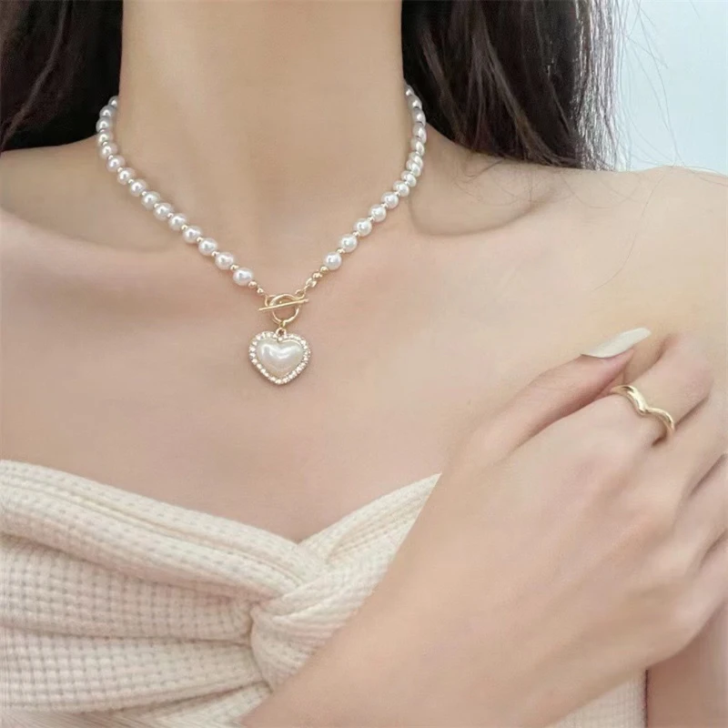 Korean Fashion Love Heart Pearl Chonker Necklaces For Women Western Elegant Aesthetic Luxury Clavicle Chain 2022 Trend Jewelry
Korean Fashion Love Heart Pearl Chonker Necklaces For Women Western Elegant Aesthetic Luxury Clavicle Chain 2022 Trend Jewelry