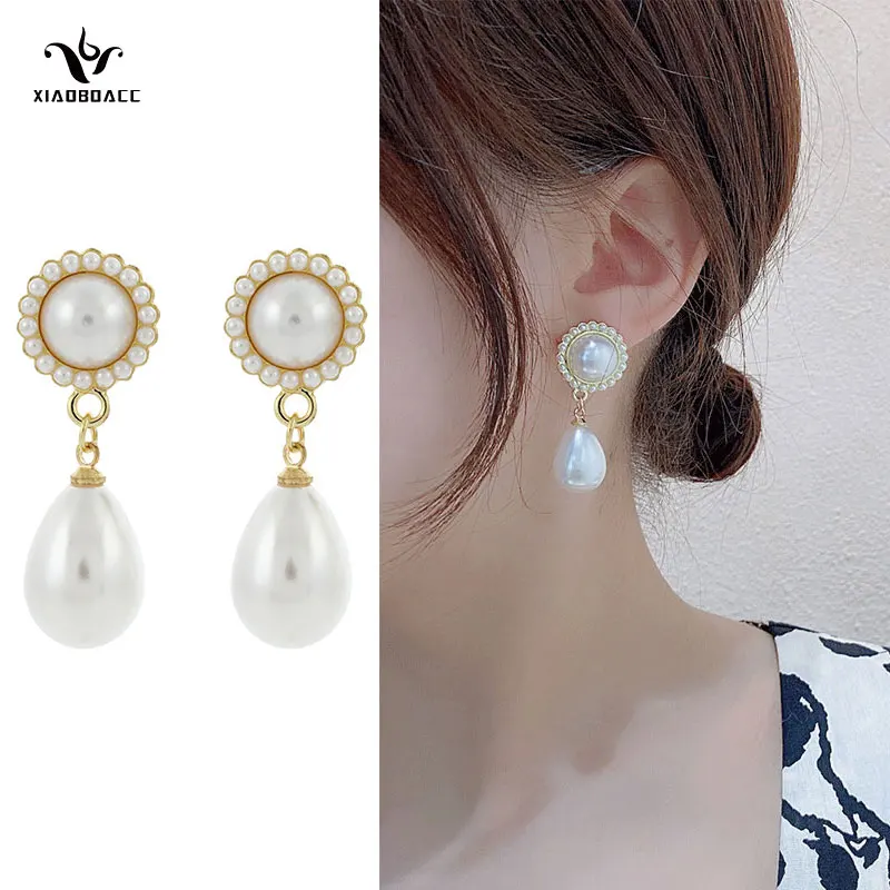 XiaoboACC 925 Silver Needle Pearl Water Drop Earrings for Women Fashion Vintagle Dangle Earrings Jewelry Wholesale
XiaoboACC 925 Silver Needle Pearl Water Drop Earrings for Women Fashion Vintagle Dangle Earrings Jewelry Wholesale