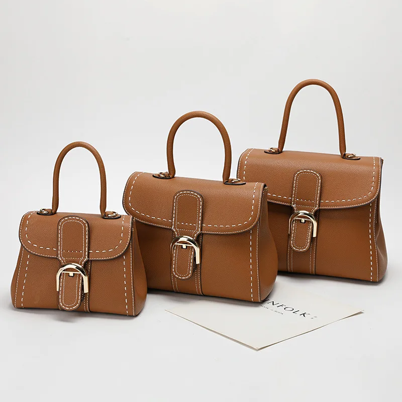 Fashion Genuine Leather Buckle Bags for Women Hand Stitch Cowhide Handbags Classic All-match Commuter Crossbody Shoulder Bag
Fashion Genuine Leather Buckle Bags for Women Hand Stitch Cowhide Handbags Classic All-match Commuter Crossbody Shoulder Bag