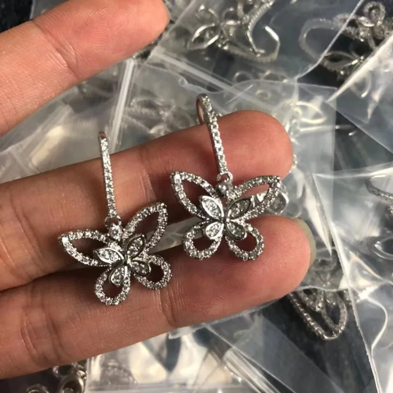 S925 Glacier's Phantom Butterfly Earrings, Micro Inlaid Diamond Women's Earrings, Micro Inlaid High Edition Hollow out Earrings
S925 Glacier's Phantom Butterfly Earrings, Micro Inlaid Diamond Women's Earrings, Micro Inlaid High Edition Hollow out Earrings