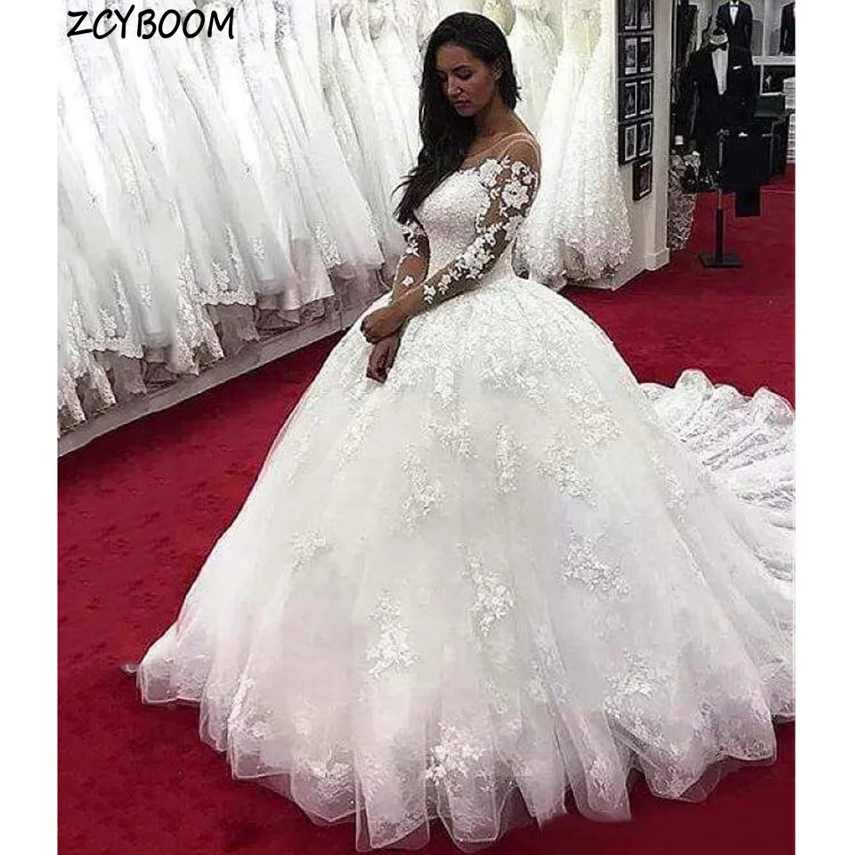 Elegant White O-Neck Appliques Long Sleeves Wedding Dress 2024 Ball Gown Floor Length Sweep Train Tulle Custom Made Bridal Gown 
Elegant White O-Neck Appliques Long Sleeves Wedding Dress 2024 Ball Gown Floor Length Sweep Train Tulle Custom Made Bridal Gown