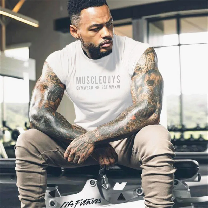 Mens Casual Muscle Fashion Running Brand Sports Small Half Sleeve TShirt Workout Gym Clothing Fitness Tank Top Bodybuilding Vest
Mens Casual Muscle Fashion Running Brand Sports Small Half Sleeve TShirt Workout Gym Clothing Fitness Tank Top Bodybuilding Vest