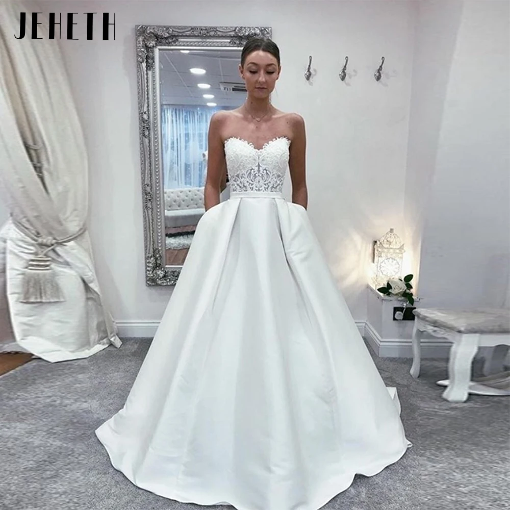 JEHETH Off The Shoulder Wedding Dresses 2022 Lace Appliques Top Satin With Pocket A Line Floor Length Customer Made Bridal Gowns
JEHETH Off The Shoulder Wedding Dresses 2022 Lace Appliques Top Satin With Pocket A Line Floor Length Customer Made Bridal Gowns