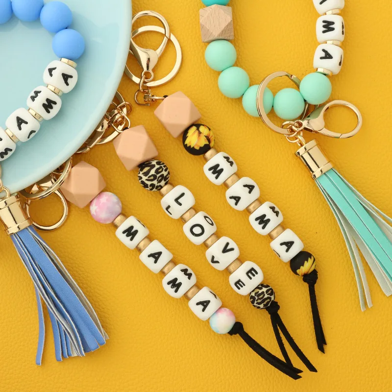 1pcs Silicone Beads MAMA Wristlet Keychain Keyring For Women Wristlet Bracelet Tassel Keychain With Charm Jewelry Accessories
1pcs Silicone Beads MAMA Wristlet Keychain Keyring For Women Wristlet Bracelet Tassel Keychain With Charm Jewelry Accessories