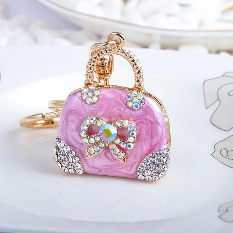 Fashion Handbag Keychain Cute Bow Crystal Rhinestone Key Ring Handbag Shaped Key Chains Car Pendant Fashion Charm Female Gift
Fashion Handbag Keychain Cute Bow Crystal Rhinestone Key Ring Handbag Shaped Key Chains Car Pendant Fashion Charm Female Gift