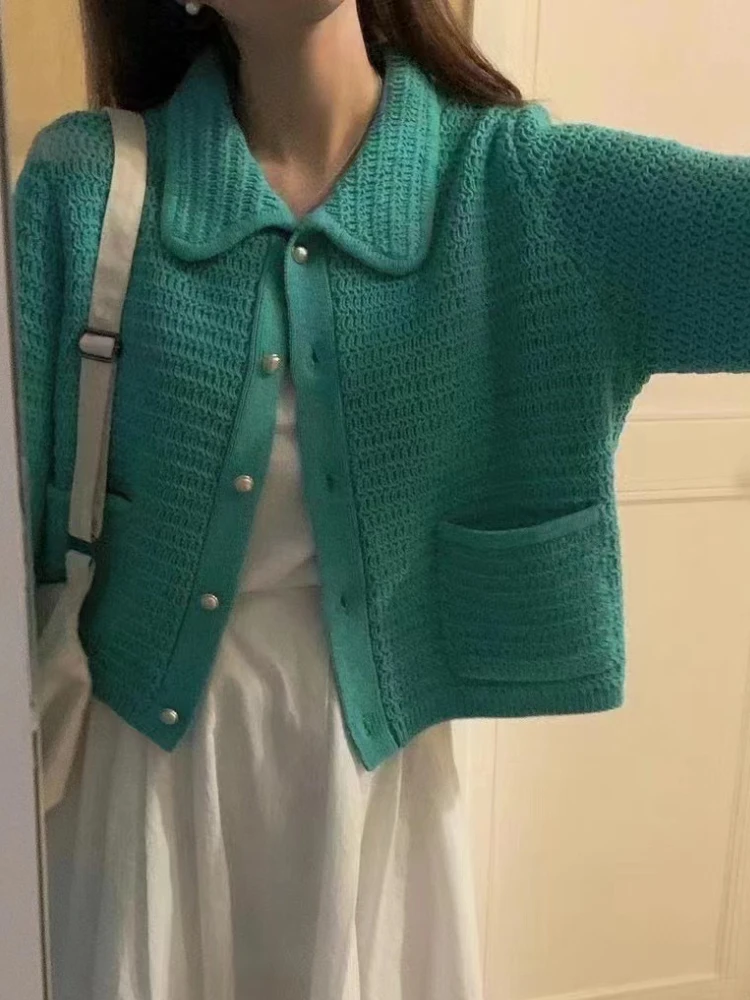 Korean Fashion Cardigan Women Winter Causal Button Polo Collar Solid Cropped Cardigan Loose Fit Long Sleeve Knitted Sweater 
Korean Fashion Cardigan Women Winter Causal Button Polo Collar Solid Cropped Cardigan Loose Fit Long Sleeve Knitted Sweater
