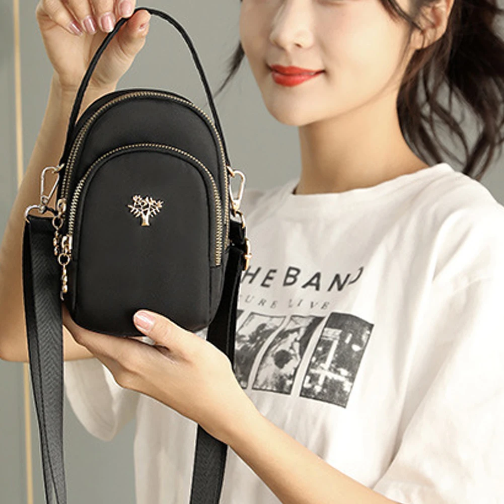 Ladies Top Handbags Nylon Messenger Bags with Earphone Hole Simple Portable Adjustable Strap Phone Number Bag Shoulder Bag
Ladies Top Handbags Nylon Messenger Bags with Earphone Hole Simple Portable Adjustable Strap Phone Number Bag Shoulder Bag