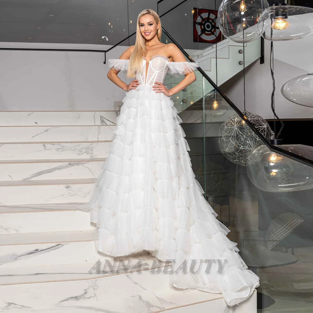 Anna A Line Tiered High End Wedding Dresses For Women Off The Shoulder V Neck Lacing Up Court TrainTulle Vestido De Casamento
Anna A Line Tiered High End Wedding Dresses For Women Off The Shoulder V Neck Lacing Up Court TrainTulle Vestido De Casamento