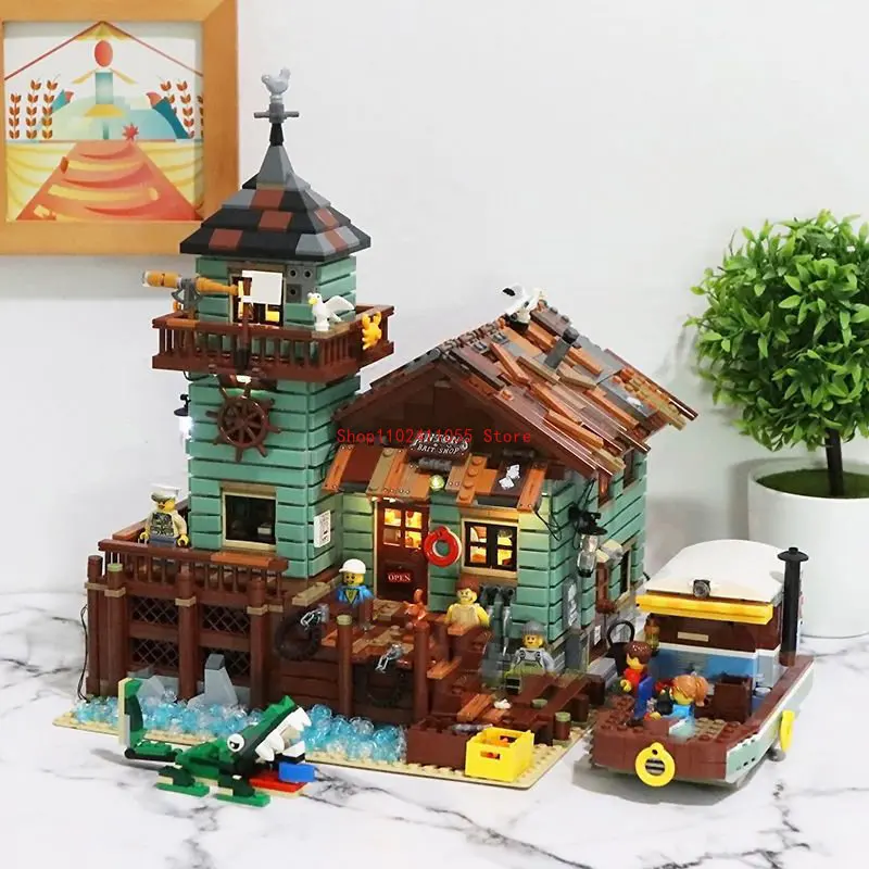Идеи старый Рыболовный магазин Рыбацкая кабина 21310 уличный вид Moc архитектура строительные блоки кирпичи модель детские игрушки подарки 2049 шт.
Идеи старый Рыболовный магазин Рыбацкая кабина 21310 уличный вид Moc архитектура строительные блоки кирпичи модель детские игрушки подарки 2049 шт.