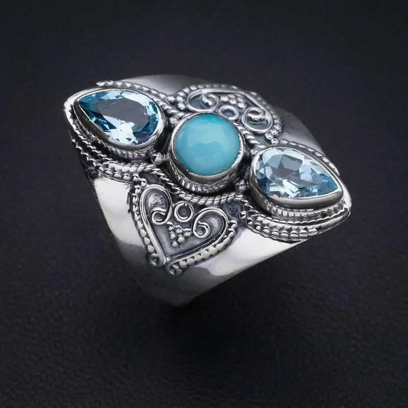 

Серебряное кольцо с голубым топазом ручной работы StarGems Larimar 10 F2791