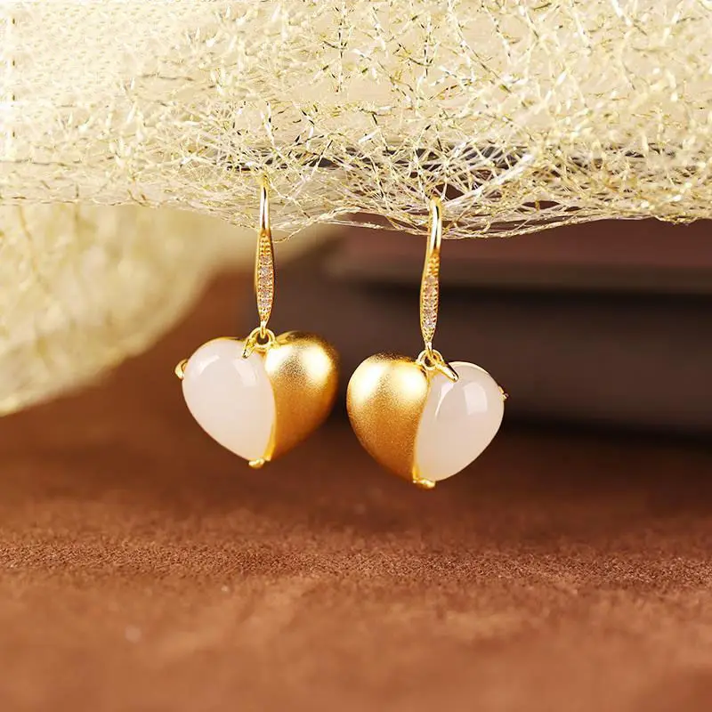natural Hetian jade love 925 earrings female frosted gold white jade high-grade heart-shaped earrings temperament ear hook
natural Hetian jade love 925 earrings female frosted gold white jade high-grade heart-shaped earrings temperament ear hook