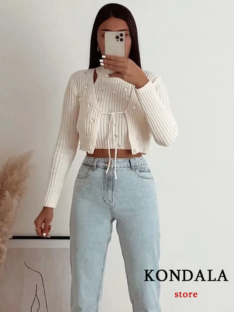 Женский вязаный кардиган с бантом KONDALA, Бежевый свитер свободного покроя с длинным рукавом, модные элегантные топы, Осень-зима 2022
Женский вязаный кардиган с бантом KONDALA, Бежевый свитер свободного покроя с длинным рукавом, модные элегантные топы, Осень-зима 2022