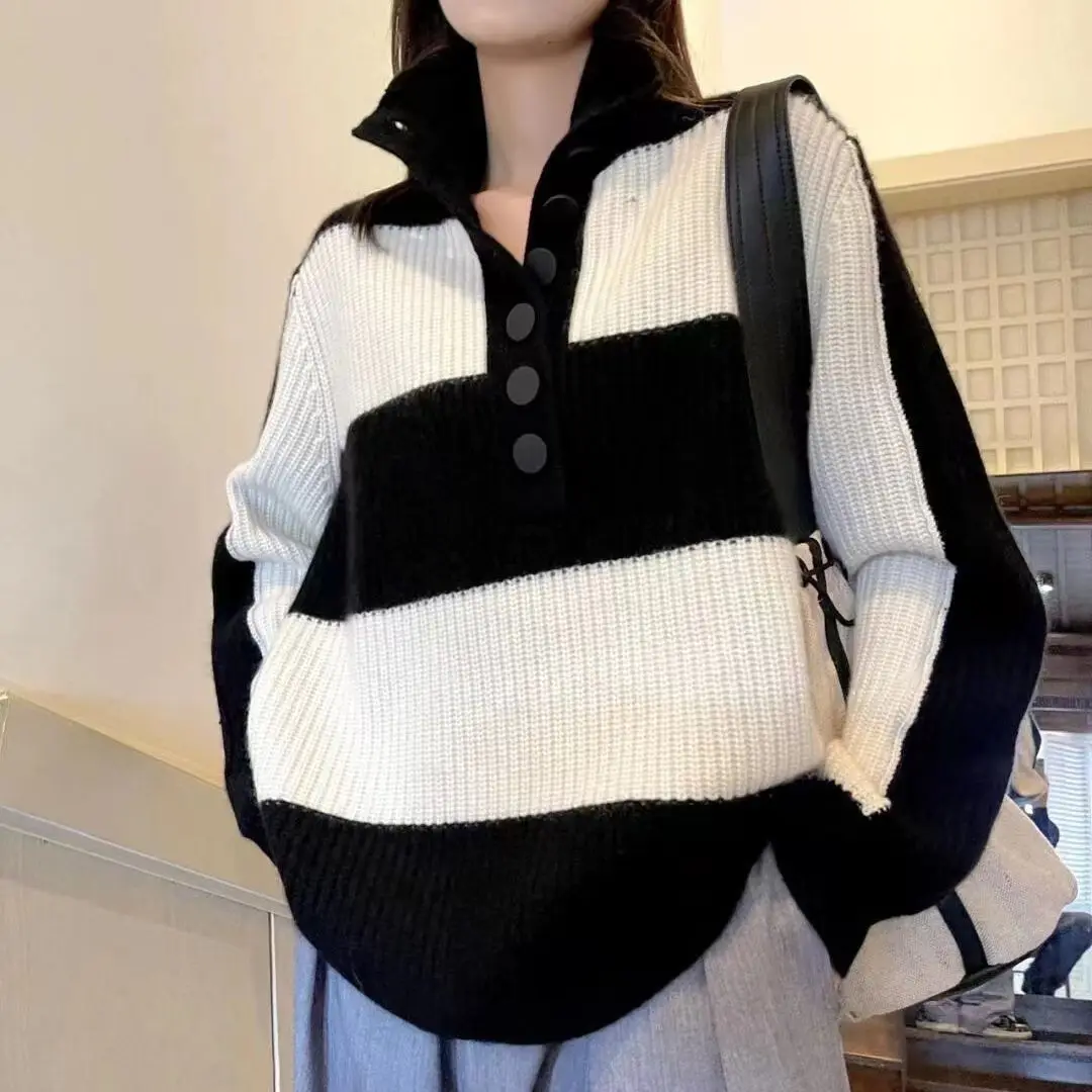 New autumn and winter high-grade sense of wearing lazy wind design sense of niche polo neck striped sweater woman
New autumn and winter high-grade sense of wearing lazy wind design sense of niche polo neck striped sweater woman