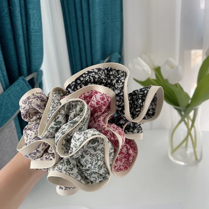 The New Wisteria Flower Gentle French Temperament Floral Edging Large Intestine Hair Ring, Women's Hair Accessories Wholesale
The New Wisteria Flower Gentle French Temperament Floral Edging Large Intestine Hair Ring, Women's Hair Accessories Wholesale