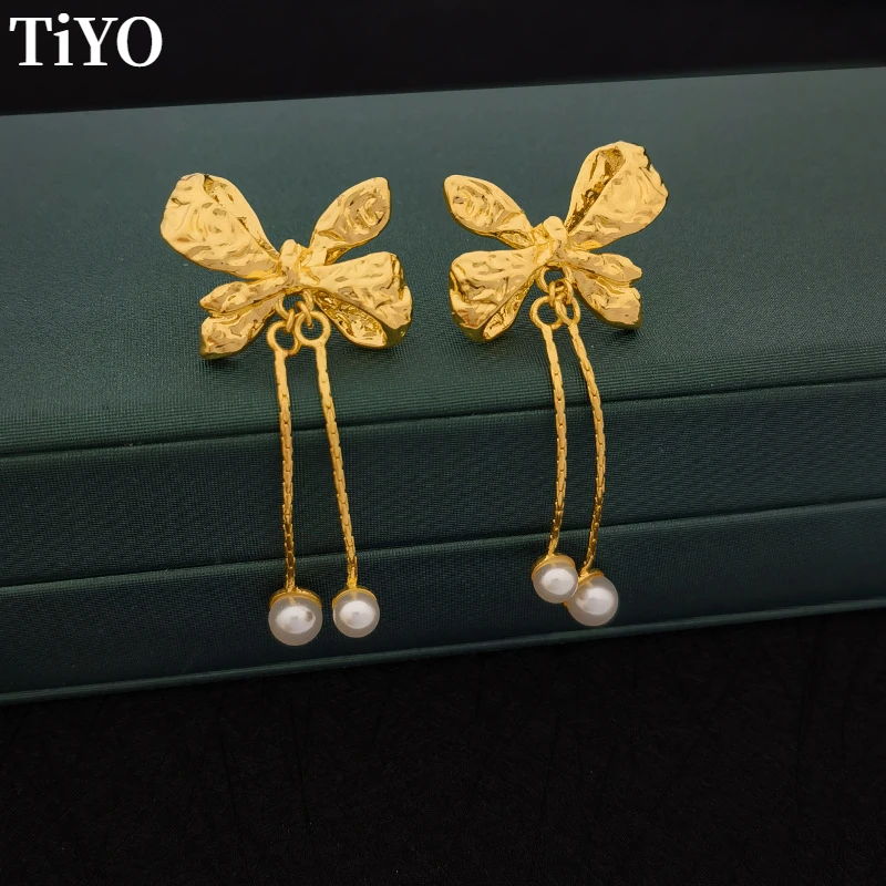 Retro Jewelry Bowknot Earrings 925 Silver Needle Vintage Temperament Copper Metal Simulated Pearl Earrings For Women 2022
Retro Jewelry Bowknot Earrings 925 Silver Needle Vintage Temperament Copper Metal Simulated Pearl Earrings For Women 2022