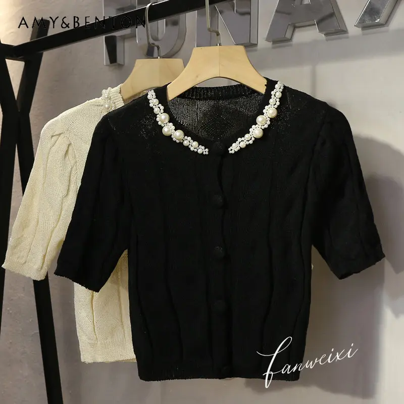 Summer 2023 New Temperament Heavy Industry Beads Knitted T-shirt Round Neck Short Sleeve Ice Silk Sweater Female Petite Top
Summer 2023 New Temperament Heavy Industry Beads Knitted T-shirt Round Neck Short Sleeve Ice Silk Sweater Female Petite Top