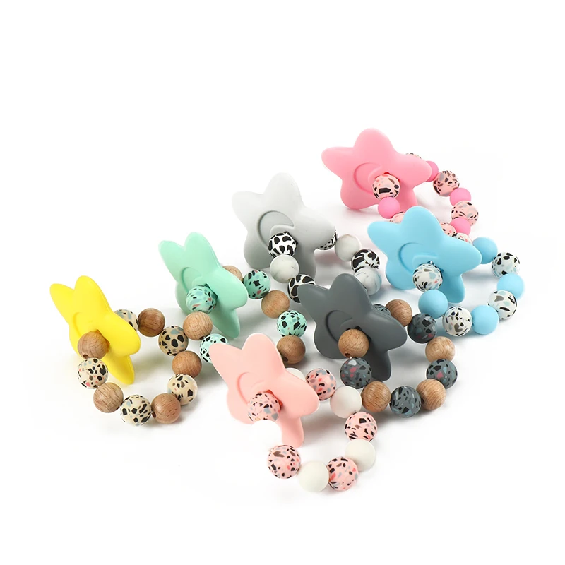 1Pcs 7Color Cute Pentagram Baby Teether Bracelet Food Grade Silicone Pendant Baby Tooth Nursing Molar Toys Gift Teether Bracelet
1Pcs 7Color Cute Pentagram Baby Teether Bracelet Food Grade Silicone Pendant Baby Tooth Nursing Molar Toys Gift Teether Bracelet