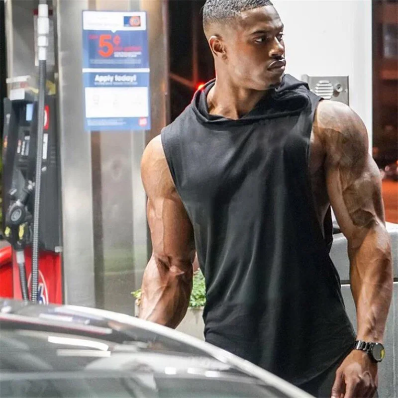 New Mens Brand Gym Clothing Fashion Cotton Men Muscle Sleeveless Vest Loose Bodybuilding Hooded Tank Top Sweatshirt Workout Tops 
New Mens Brand Gym Clothing Fashion Cotton Men Muscle Sleeveless Vest Loose Bodybuilding Hooded Tank Top Sweatshirt Workout Tops