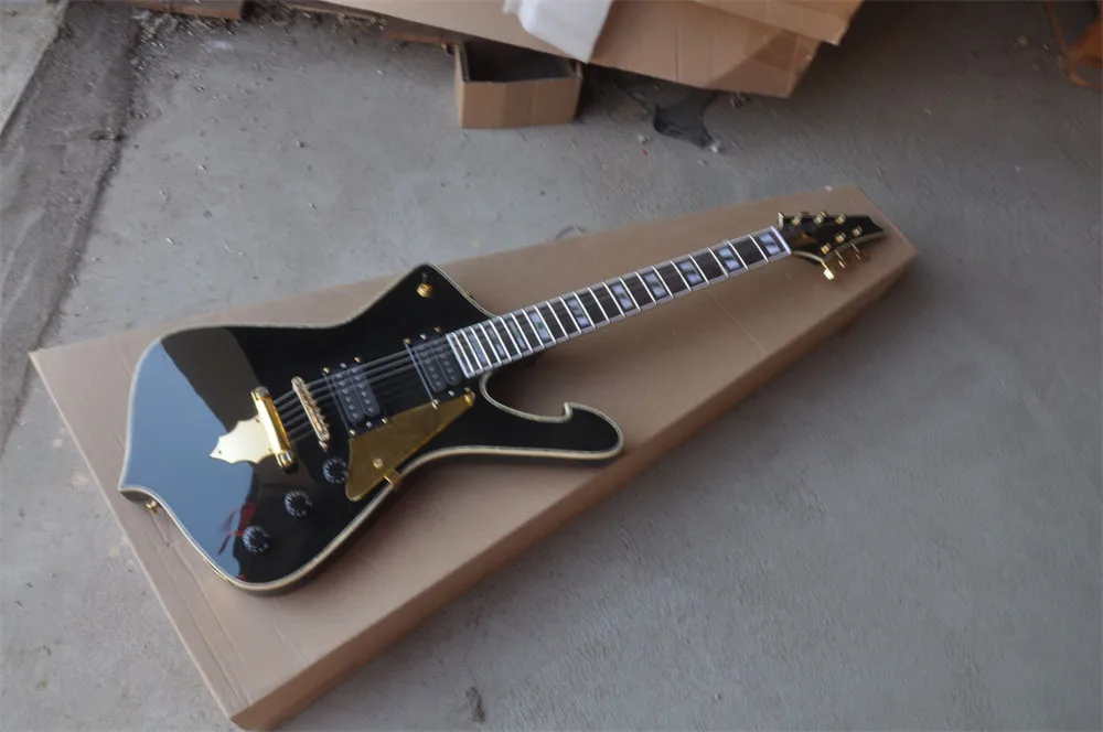 Color shell inlaid fingerboard Alien Shaped Signature black electric guitar free shipping real photos in stock 202234 
Color shell inlaid fingerboard Alien Shaped Signature black electric guitar free shipping real photos in stock 202234