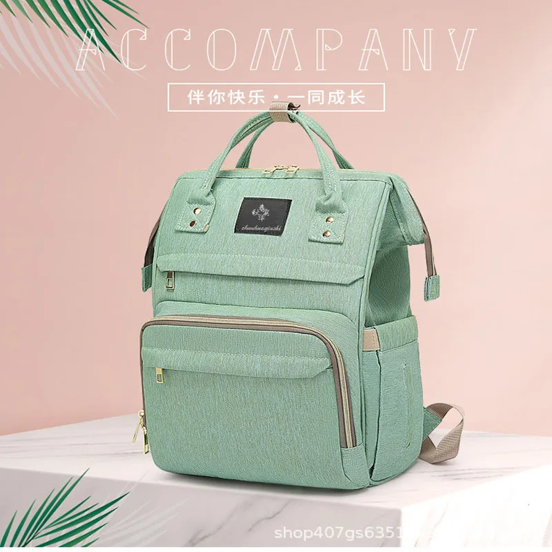

2022 New Multifunctional Fashion Mommy Bag Going Out Convenient Large Capacity Backpack Waterproof and Insulated Mommy Bag