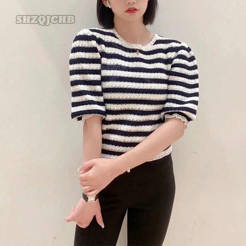 Женская футболка в полоску, повседневный Свободный вязаный пуловер с коротким рукавом, весна-лето 2022
Женская футболка в полоску, повседневный Свободный вязаный пуловер с коротким рукавом, весна-лето 2022