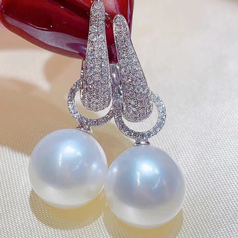 2023 Brand New Women's French Oversized White Imitation Pearl Drop Earrings Boho Gold Round Pearl Wedding Jewelry Gifts 
2023 Brand New Women's French Oversized White Imitation Pearl Drop Earrings Boho Gold Round Pearl Wedding Jewelry Gifts