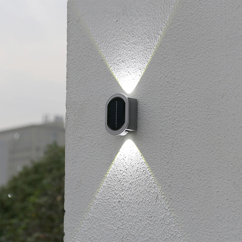 Oval Hexagonal Up Down LED Solar Outdoor Wall Light Silicon Solar Powered Waterproof Wall Lamp Dual Lighting Mode 2 Color Light
Oval Hexagonal Up Down LED Solar Outdoor Wall Light Silicon Solar Powered Waterproof Wall Lamp Dual Lighting Mode 2 Color Light